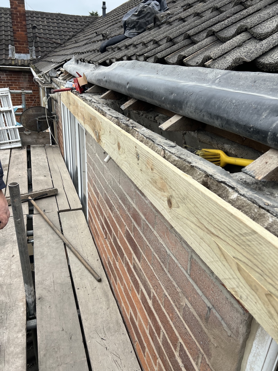 During: Finlock gutter removed and new supporting timber fitted
