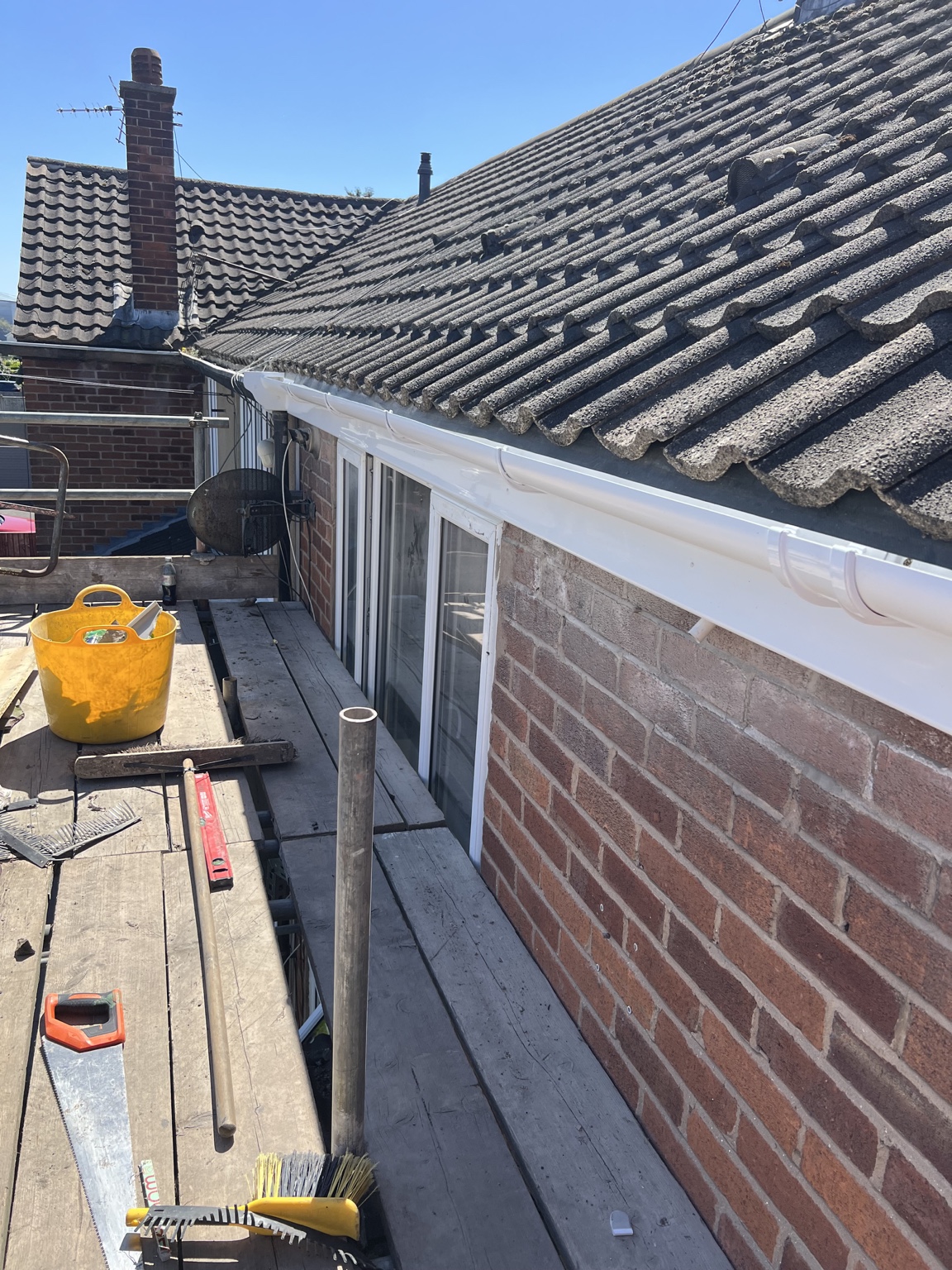 After: completed white fascia soffit and gutter installation